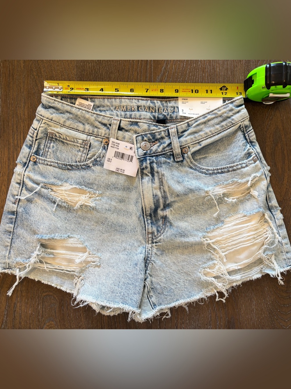 American Eagle Outfitters Light Wash Distressed Denim “Mom Shorts”